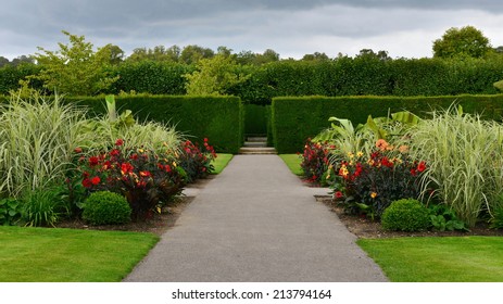 Stone Pathway through a Beautiful Green Park - Powered by Shutterstock