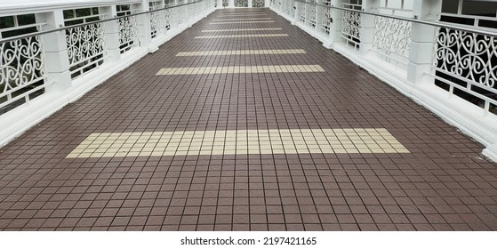 Stone Paved Outdoor Pedestrian Way, Side Walk, Path, Flooring, Footpath, Pavement, Road, Floor With White Metallic Side Wall Handrail Or Railing Border Fence For Safety And Protection. Beautiful View.