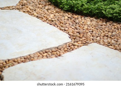 Stone pavement, cement walkway,  brick, stone slabs for garden architecture pathway, gravel. Simple paths with grass field. Front or back yard landscape design and marble tile. Gardening beside way.