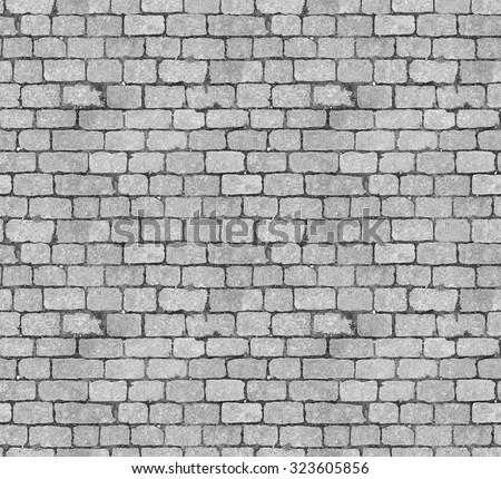 Stone pavement texture. Granite cobblestoned pavement background. Abstract background of old cobblestone pavement close-up. Seamless texture. Perfect tiled on all sides