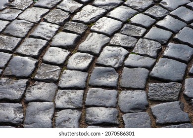 Stone pavement texture in perspective. Granite pavers background