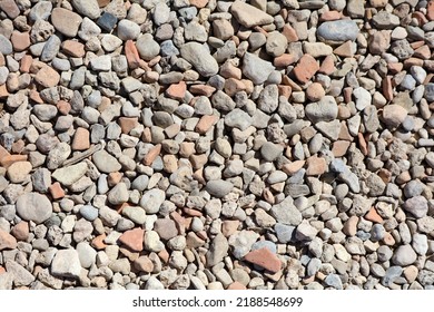 Stone pebbles as an abstract background. Texture - Shutterstock ID 2188548699