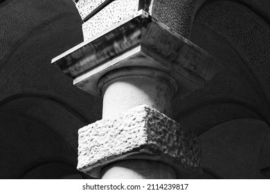 Stone pillar details. Old classic architecture example. St. Petersburg, Russia. Black and white architectural photo