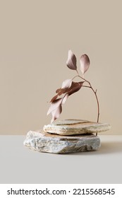 Stone podium mock up with dry leaves, mock up for product cosmetic on beige background, copy space, vertical - Shutterstock ID 2215568545