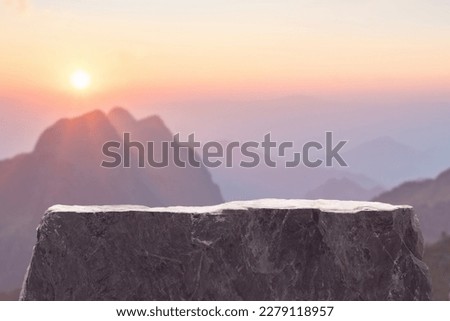 Stone podium outdoors on sky pink pastel soft cloud with misty mountain nature landscape background.Beauty cosmetic product placement pedestal present minimal display,summer paradise dreamy concept.