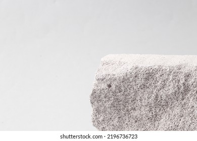 Stone porous platform on a gray background. Creative natural showcase - Shutterstock ID 2196736723