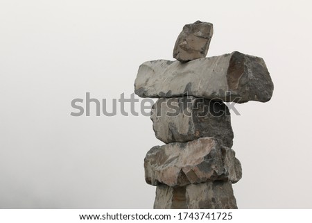 stone pyramid inukshuk in whistler blackcomb. 