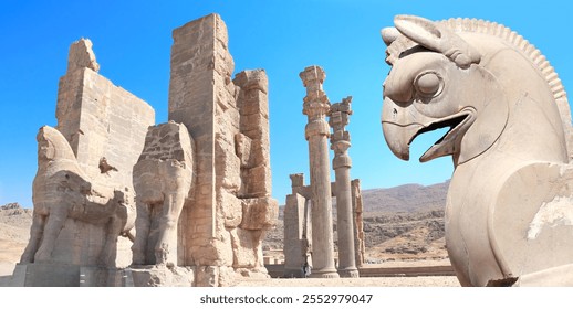 Stone sculpture of griffin and Gate of All Nations (Xerxes Gate) with stone statues of lamassu in ancient city Persepolis, Iran