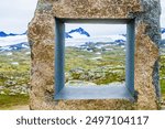 Stone sculpture at Mefjellet viewpoint. National tourist scenic route 55 Sognefjellet, Norway. Jotunheimen National Park