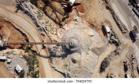 Stone Sorting Conveyor Belt In A Large Quarry - Top Down Aerial View