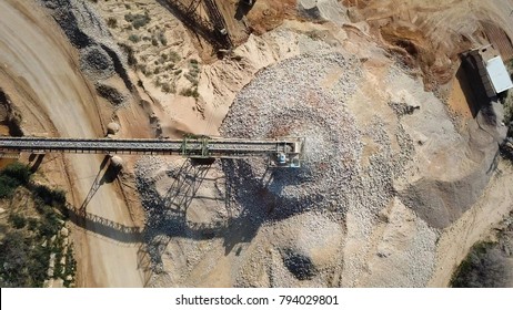 Stone Sorting Conveyor Belt In A Large Quarry - Top Down Aerial View