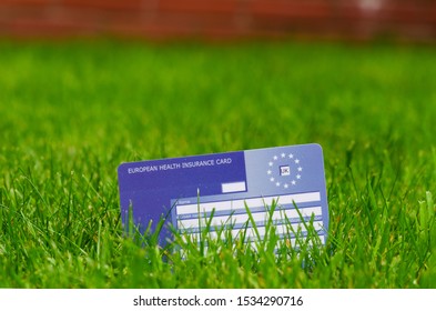 Stone, Staffordshire / UK - October 13 2019: European Health Insurance Card On The Grass. Issued By NHS. The EHIC Card Covers You Against Illness Or Injury In Europe.