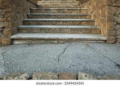 Stone staircase made of hewn rectangular blocks.                               