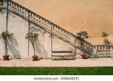 Stone staircase surrounded by plants and a bench is perfect for relaxing - Powered by Shutterstock