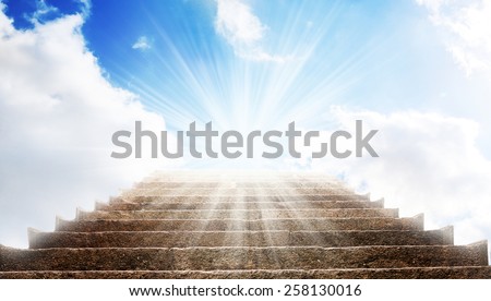 stone stairs, like a path to the blue sky and white clouds, with sunlight shining, like a ladder to the heaven