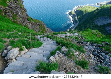 Stone stairs to the top of Reinebringen. Touristic path to the Reine viewpoint, Reine, Lofoten, Norway.