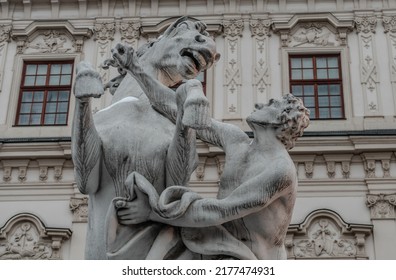 Stone statue outside the Belvedere palace in Vienna