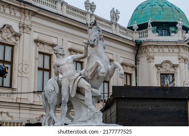 Stone statue outside the Belvedere palace in Vienna