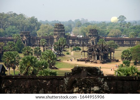 stone statues of the ancient temple complex of angkor watt in cambodia