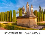 Stone Statues of Christopher Columbus and Catholic Monarchs, Queen Isabella I of Castile and King Ferdinand II of Aragon, in the gardens of the Alcazar in Cordoba, Andalusia, Spain