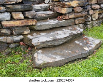 Stone Steps Going Through Rock Wall