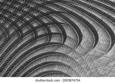 Stone structure. Abstract material background for construction industry, architecture, design or technology. Fragment of brick wall. Geometric pattern with curved elements.