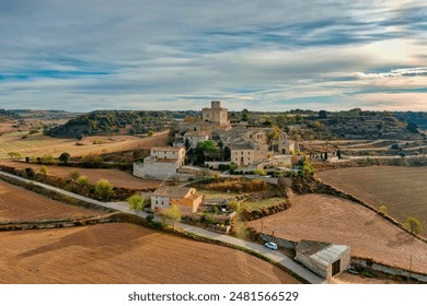 A stone structure in a rural landscape - Powered by Shutterstock