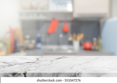Stone table top and blurred kitchen interior background - can used for display or montage your products.