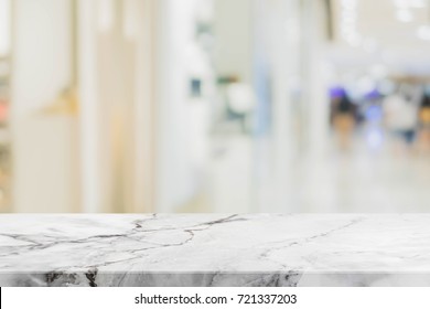 Stone table top on blurred with bokeh shopping mall background - can be used for display or montage your products - Shutterstock ID 721337203