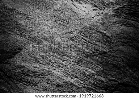 Stone texture abstract background. Detail of natural material gray granite old rock wall surface with grunge nature rough pattern