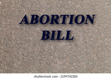 Stone Texture Background With Text Abortion Bill