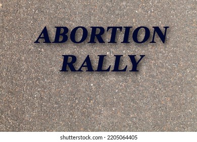 Stone Texture Background With Text Abortion Rally