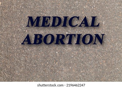 Stone Texture Background With Text Medical Abortion