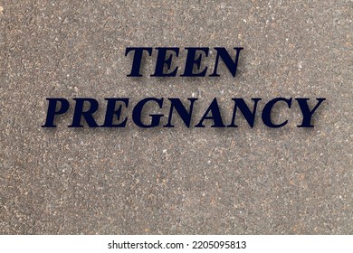 Stone Texture Background With Text Teen Pregnancy