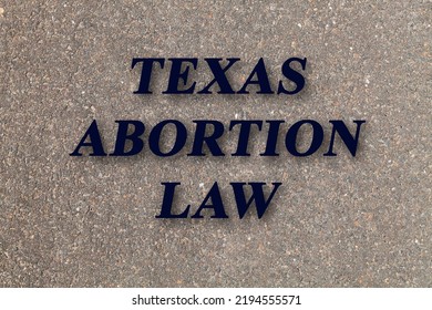 Stone Texture Background With Text Texas Abortion Law