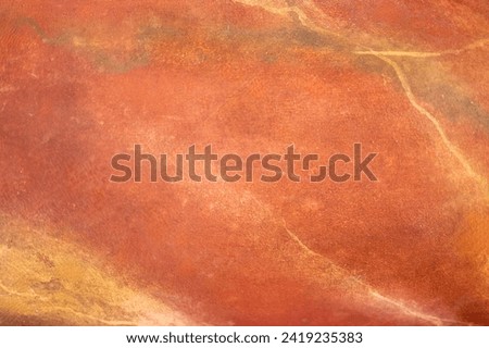 stone texture. Luxurious, polished red and orange stone texture. Sleek, glossy appearance enhances visual appeal. high-end designs. radiant backdrop.