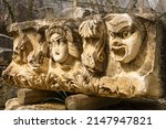Stone Theater masks in Myra Ancient City. Demre, Antalya, Turkey