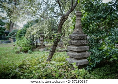
stone tower in the temple grounds