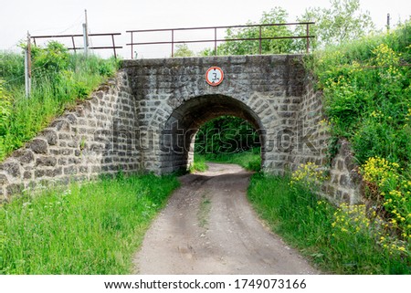 Stone tunnel under the railway