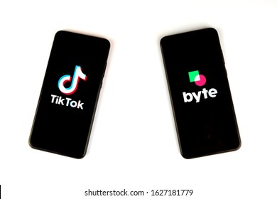 Stone / United Kingdom - January 26 2020: Byte App And Tiktok App Logos On The Smartphones Isolated On White.