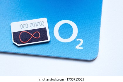 Stone  United Kingdom - May 17 2020: Virgin Media And O2 Sim Cards With Logo. Concept For Merger Of The Two Telecom Companies. Macro Photo.