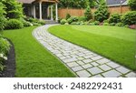 stone walkway and green grass in garden