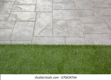 Stone Walkway,Stamped Concrete With Green Grass.