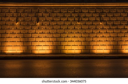 Stone wall background with lighting