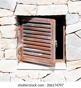 Stone Wall Background With A Trap Door