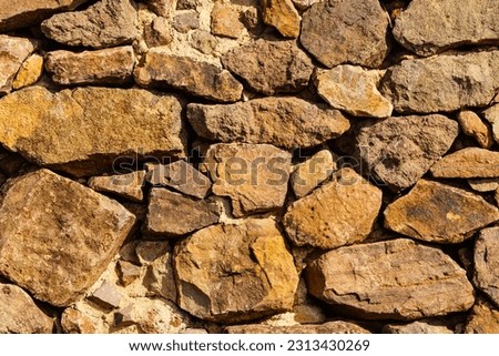Stone wall. Brown background texture