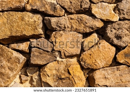 Stone wall. Brown background texture