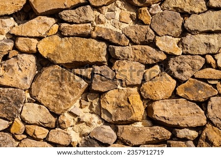 Stone wall. Brown background texture