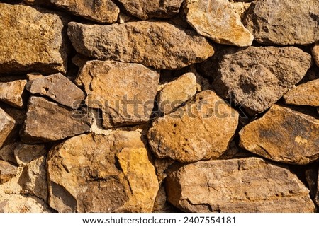 Stone wall. Brown background texture