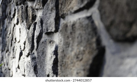 Stone Wall with Cement Texture Background Blur for Design Material